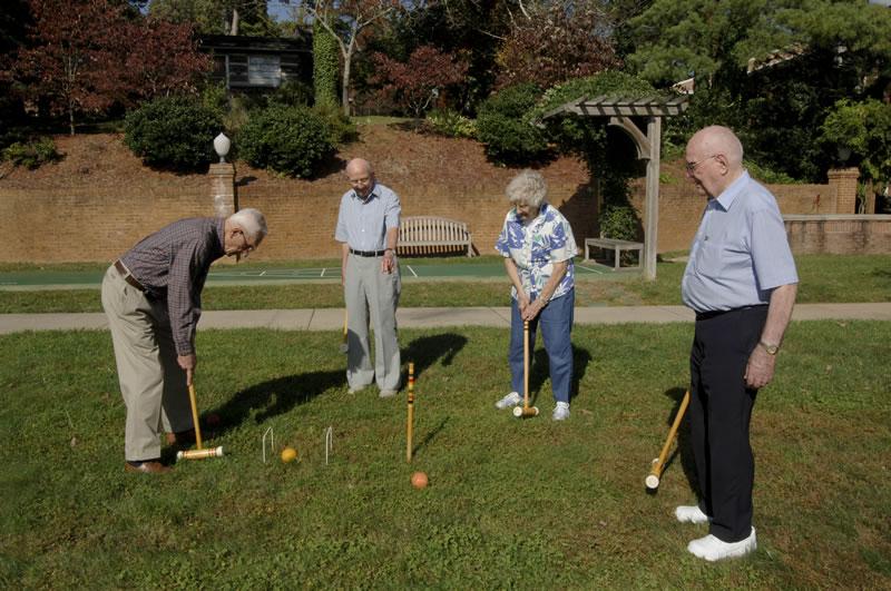 Residents enjoying croquet on the lawn
